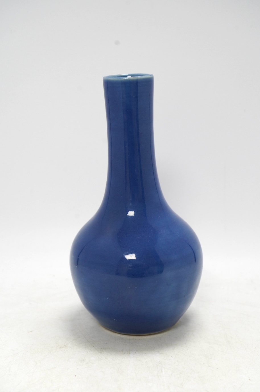A Chinese blue glazed bottle, Qianlong mark but later, 23cm high. Condition - good